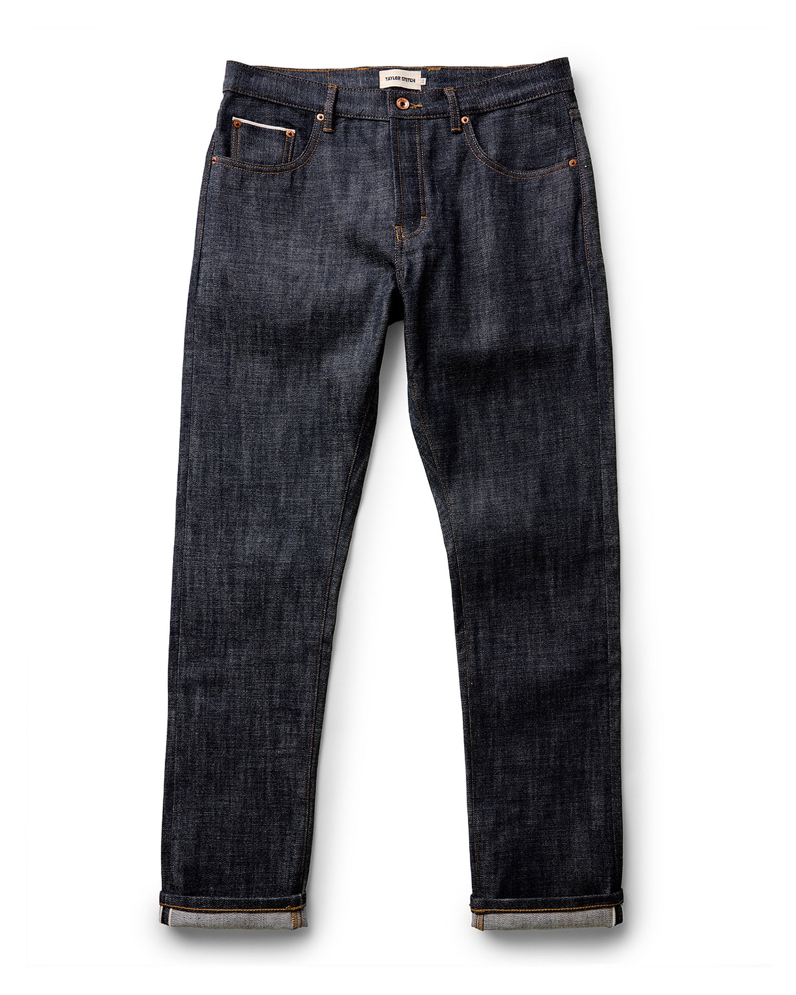 flatlay of The Democratic Jean in Rigid Organic Selvedge, Bottoms by Taylor Stitch