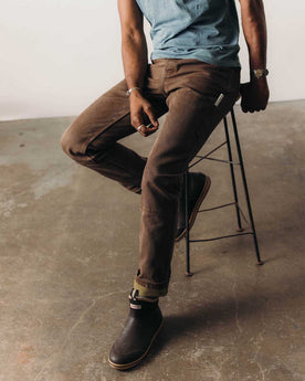 fit model with his hand in his pocket wearing The Chore Pant in Aged Penny Chipped Canvas, Bottoms by Taylor Stitch