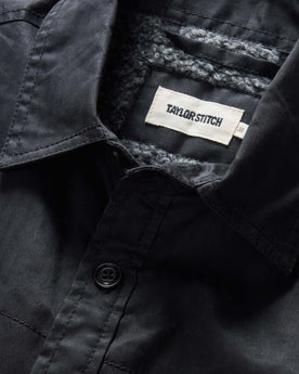 material shot of the collar on The Fender Jacket in Coal Dry Wax, Outerwear by Taylor Stitch