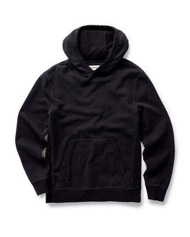 flatlay of The Apres Hoodie in Black Indigo Terry, Knits by Taylor Stitch