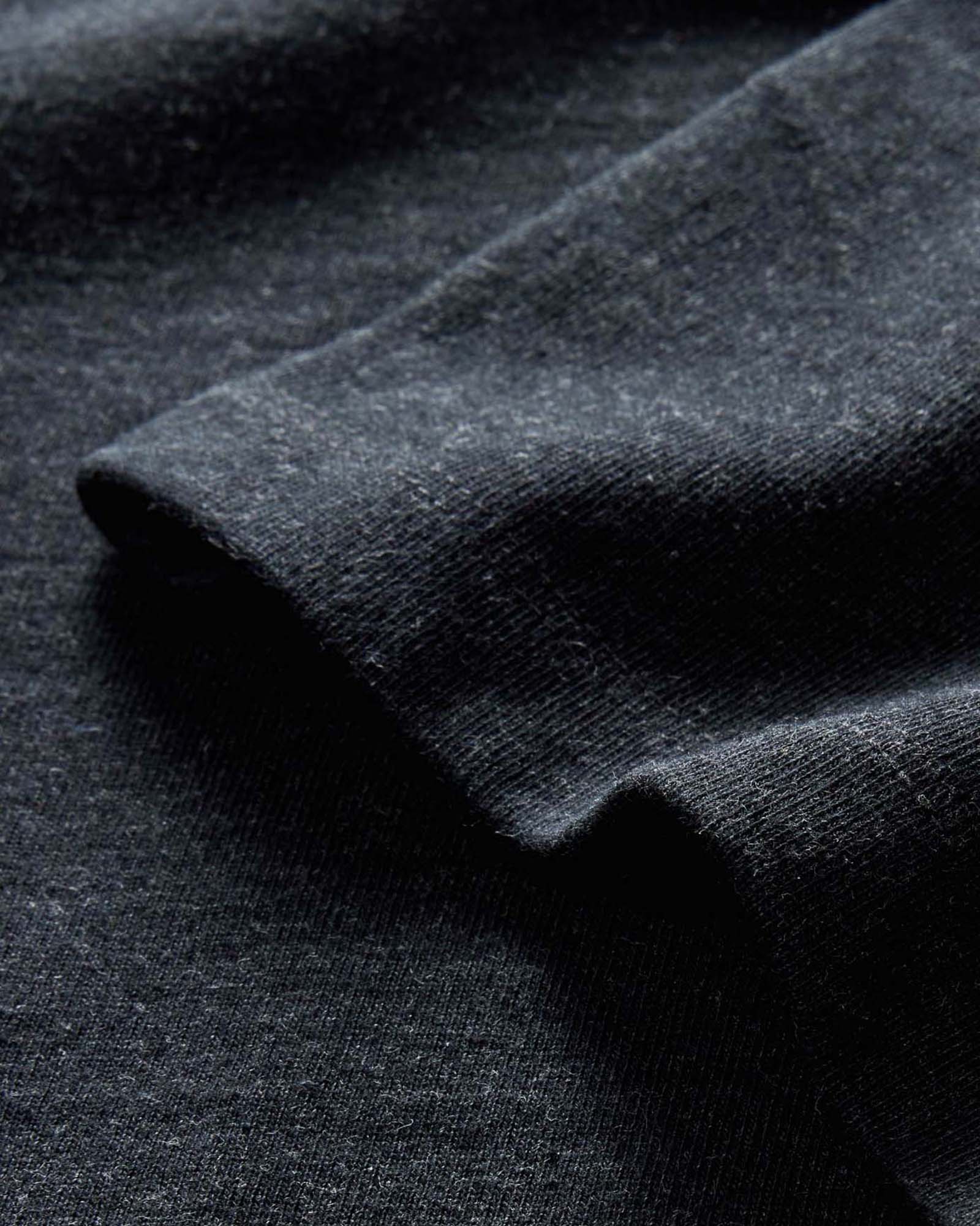 material shot of the sleeves on The Organic Cotton Shop Tee in Coal Twist, Knits by Taylor Stitch