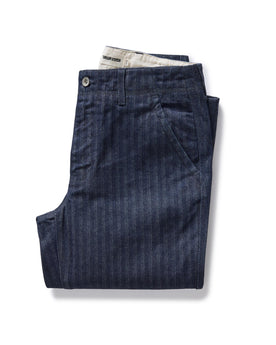 folded flatlay of The Morse Pant in Rinsed Indigo Herringbone, Bottoms by Taylor Stitch