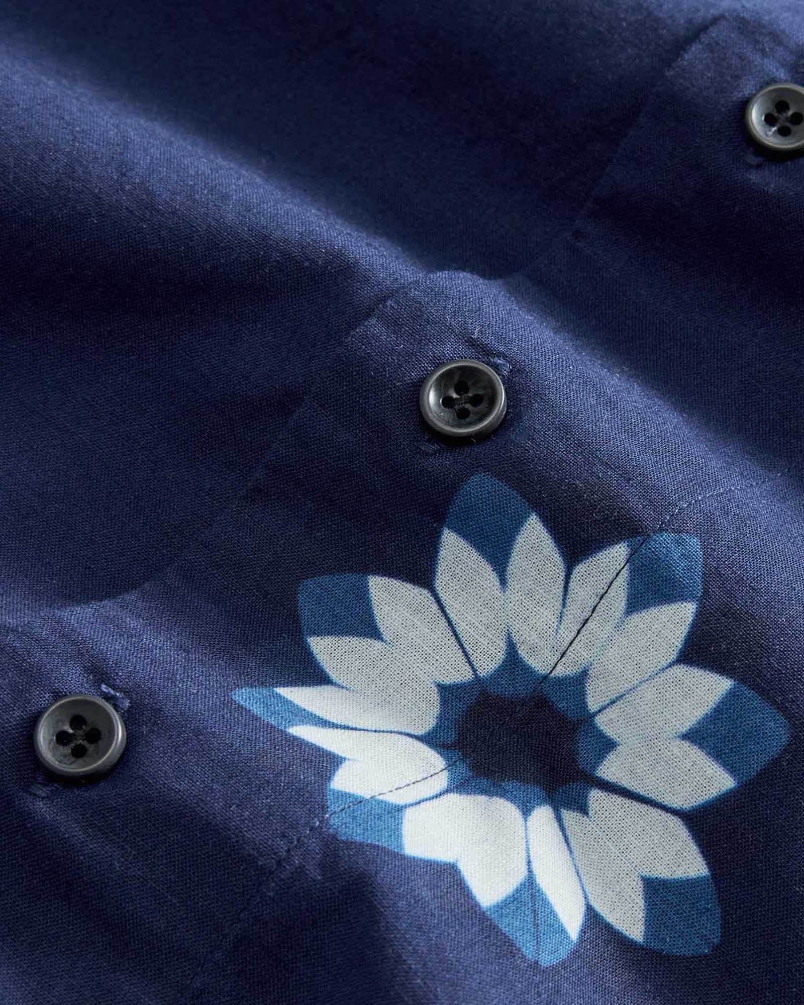 material shot of the buttons on The Davis Shirt in Dark Navy Geo, Wovens by Taylor Stitch