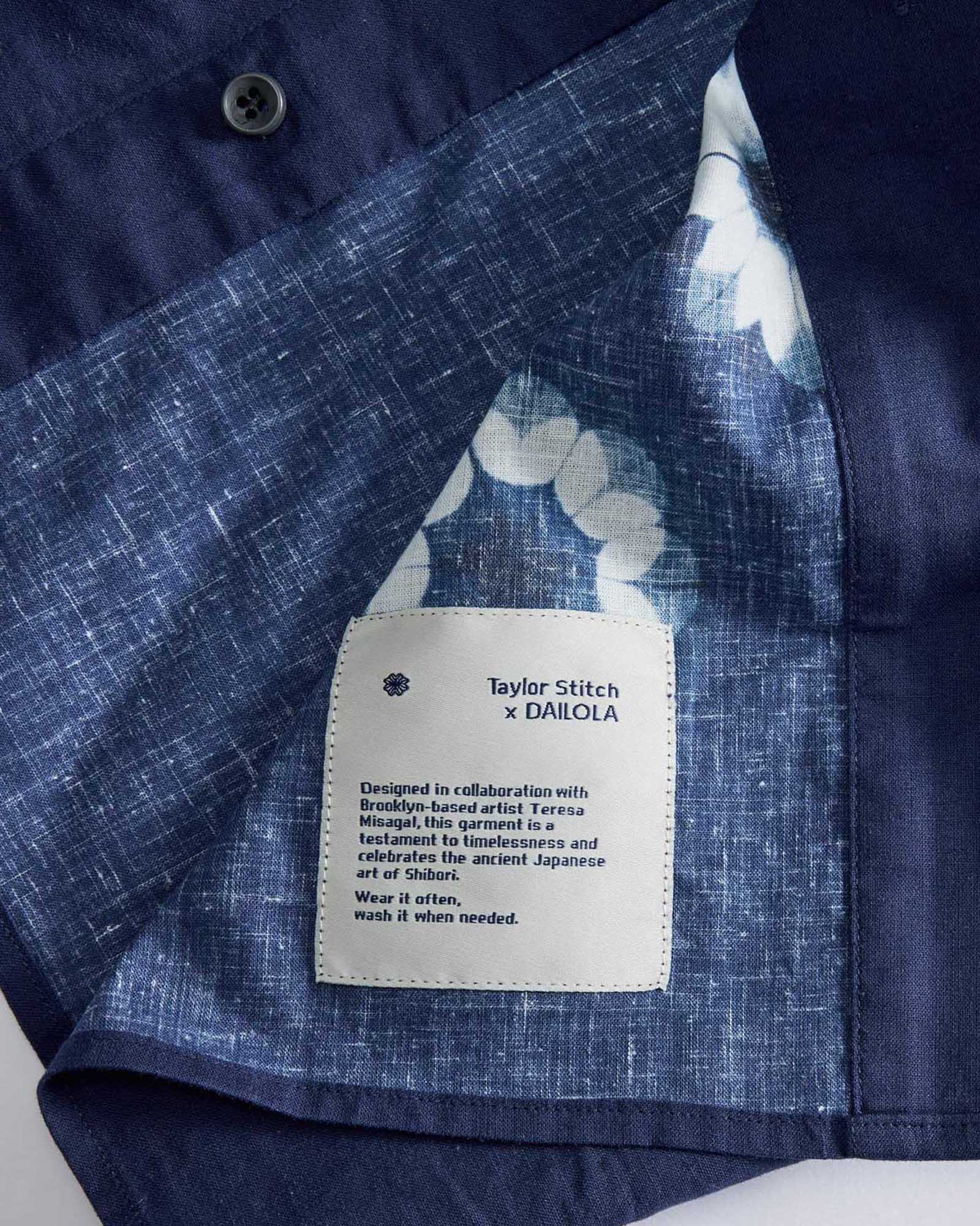 material shot of the tag on The Davis Shirt in Dark Navy Geo, Wovens by Taylor Stitch