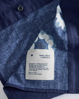 material shot of the tag on The Davis Shirt in Dark Navy Geo, Wovens by Taylor Stitch