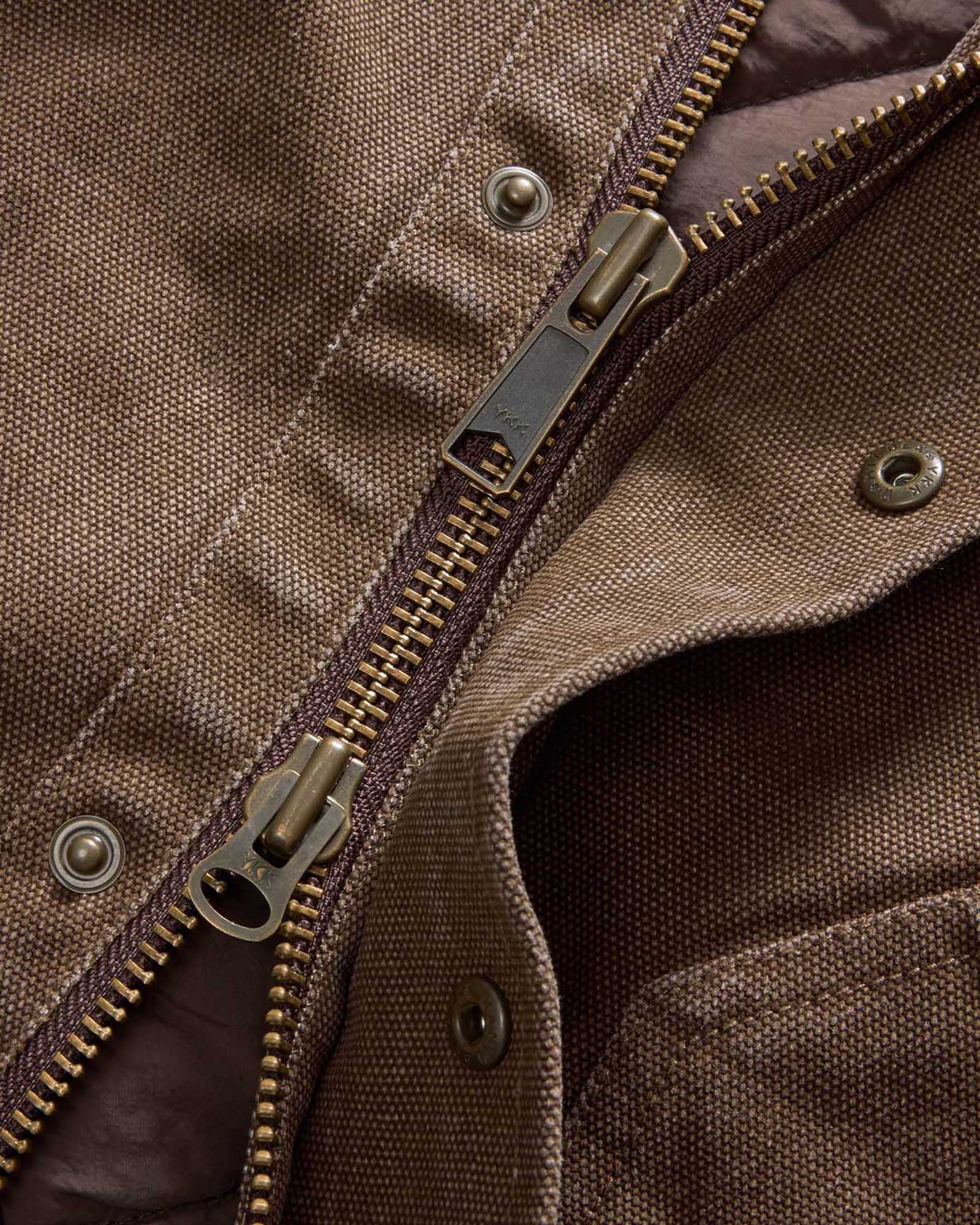 material shot of the zipper on The Workhorse Hoodie in Aged Penny Chipped Canvas, Outerwear by Taylor Stitch