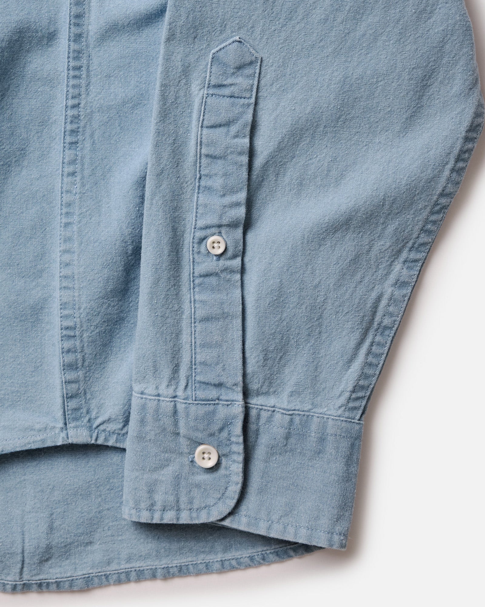 material shot of the buttons on The Jack in Washed Indigo Oxford, Wovens by Taylor Stitch