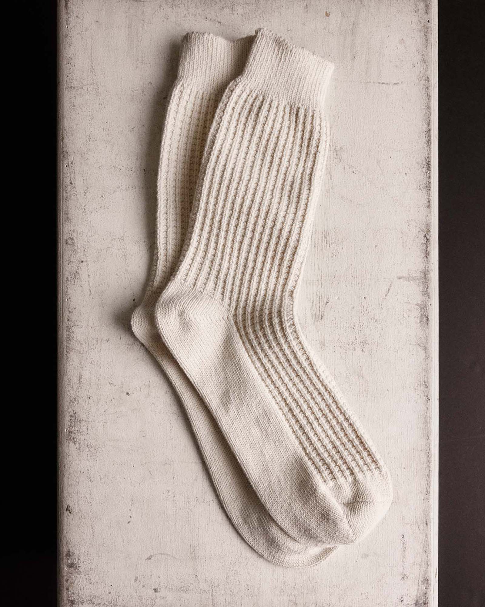 editorial flatlay of The Waffle Sock in Natural, Accessories by Taylor Stitch