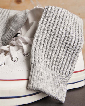 editorial image of The Waffle Sock in Heather Grey on a shoe, Accessories by Taylor Stitch