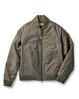 flatlay of The Insulated Bomber Jacket in Fatigue Olive Dry Wax, Outerwear by Taylor Stitch