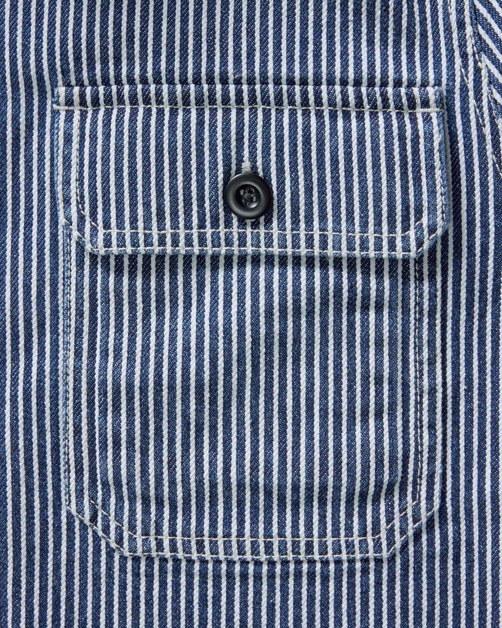 material shot of the pocket on The Shop Shirt in Rinsed Indigo Selvedge, Wovens by Taylor Stitch