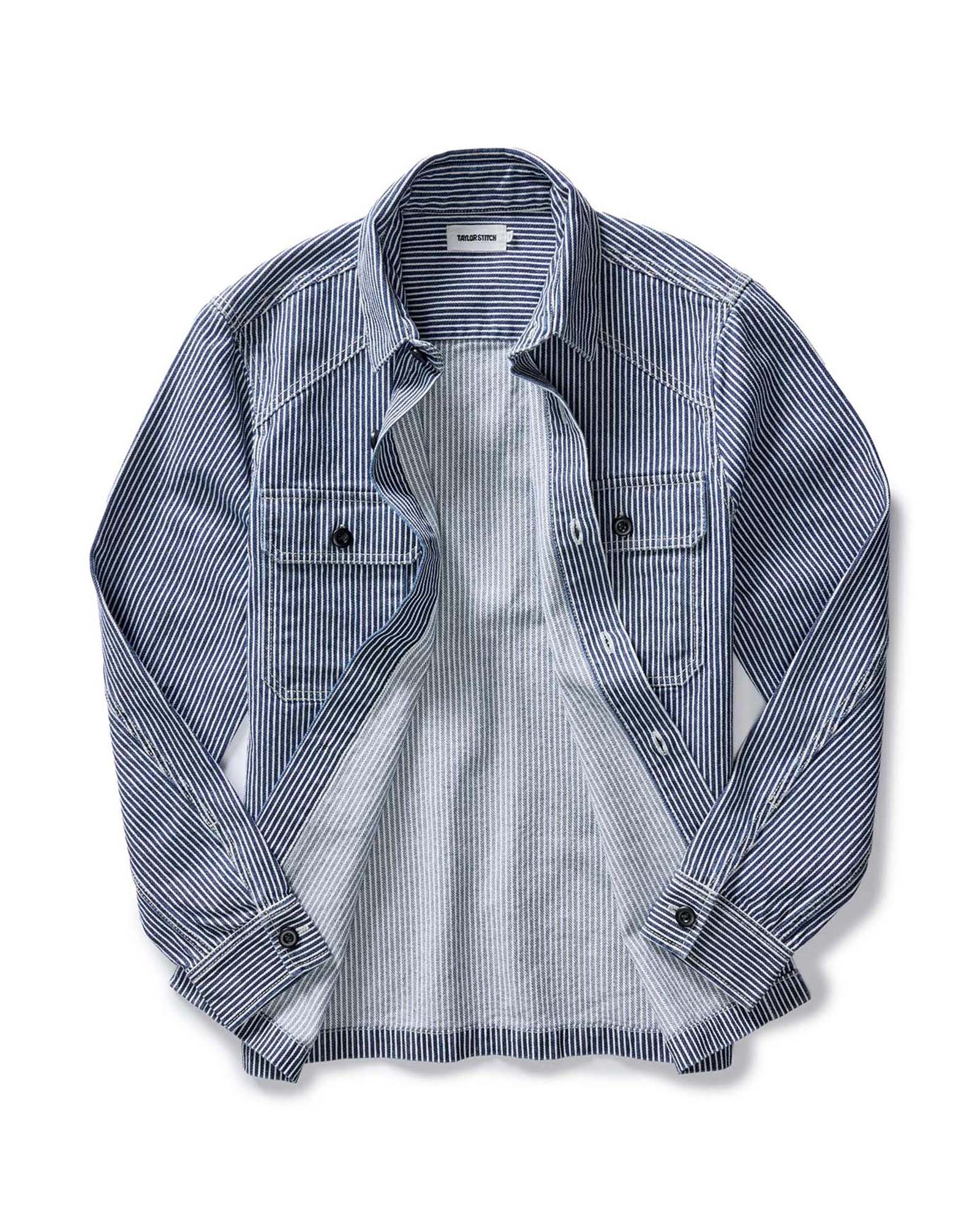flatlay of the inside lining of The Shop Shirt in Rinsed Indigo Selvedge, Wovens by Taylor Stitch