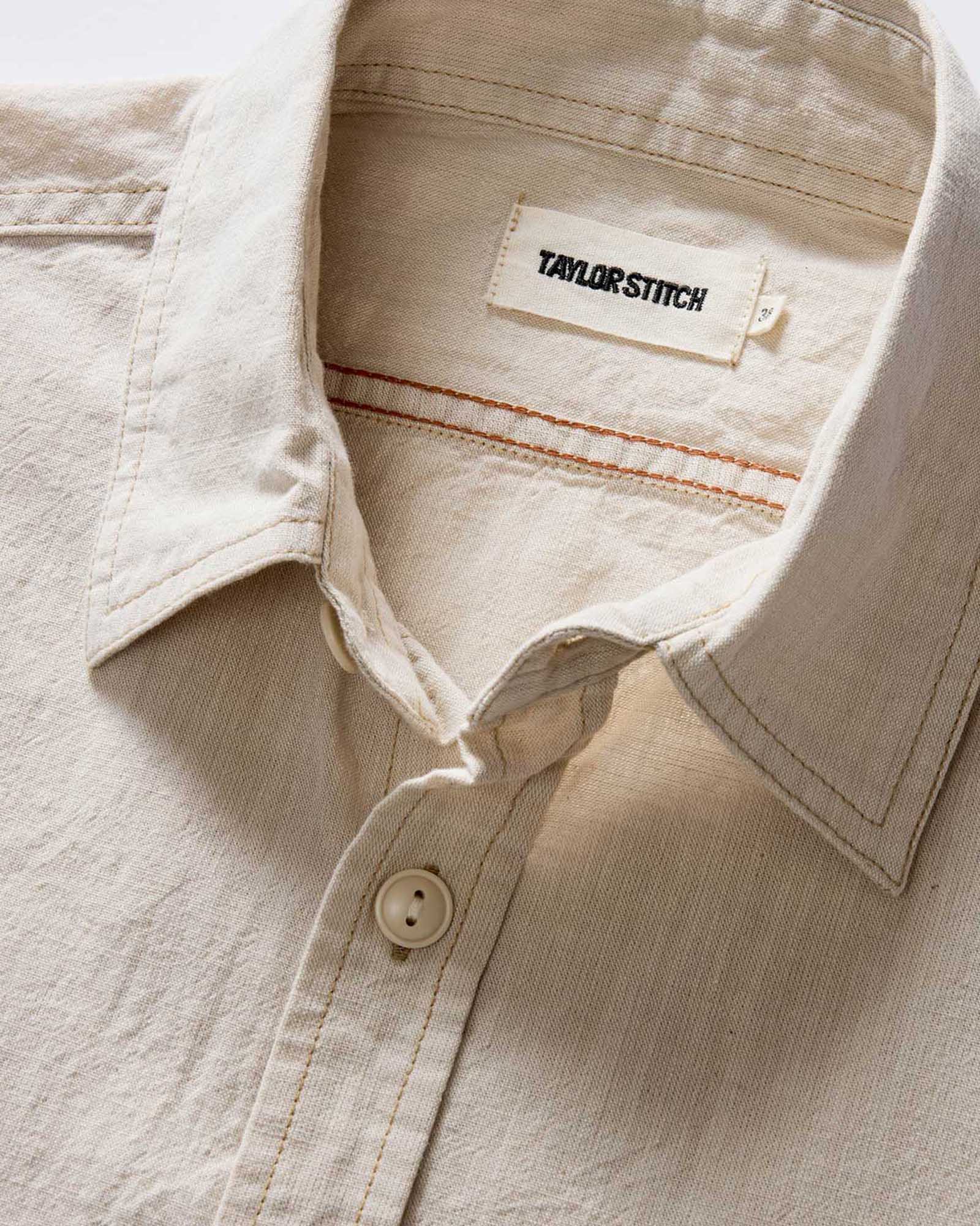 material shot of the collar on The Short Sleeve Utility Shirt in Natural Selvedge Chambray, Wovens by Taylor Stitch