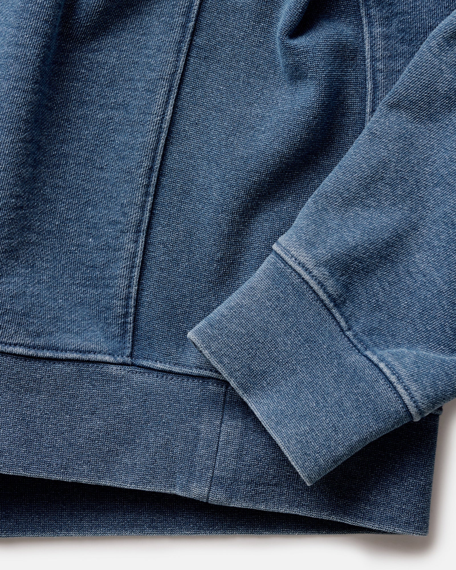 material shot of the sleeves on The Apres Crew in Washed Indigo Terry, Knits by Taylor Stitch