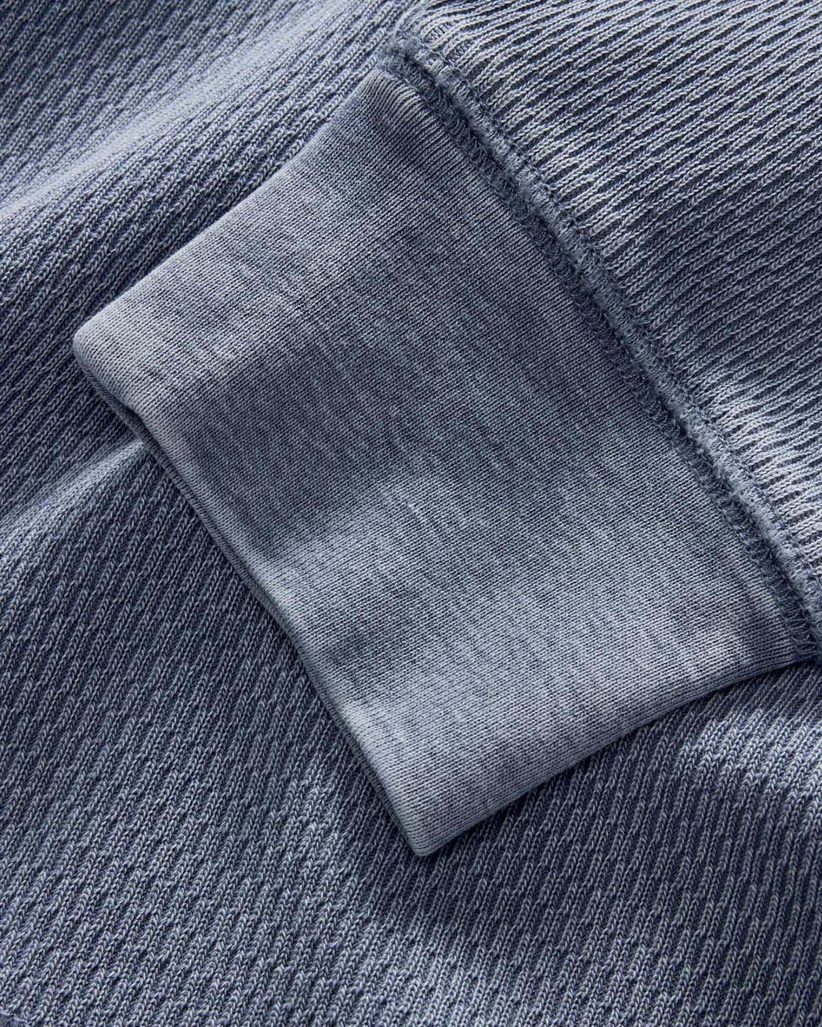 material shot of the cuffs on The Organic Cotton Crew in Washed Blue Waffle, Knits by Taylor Stitch