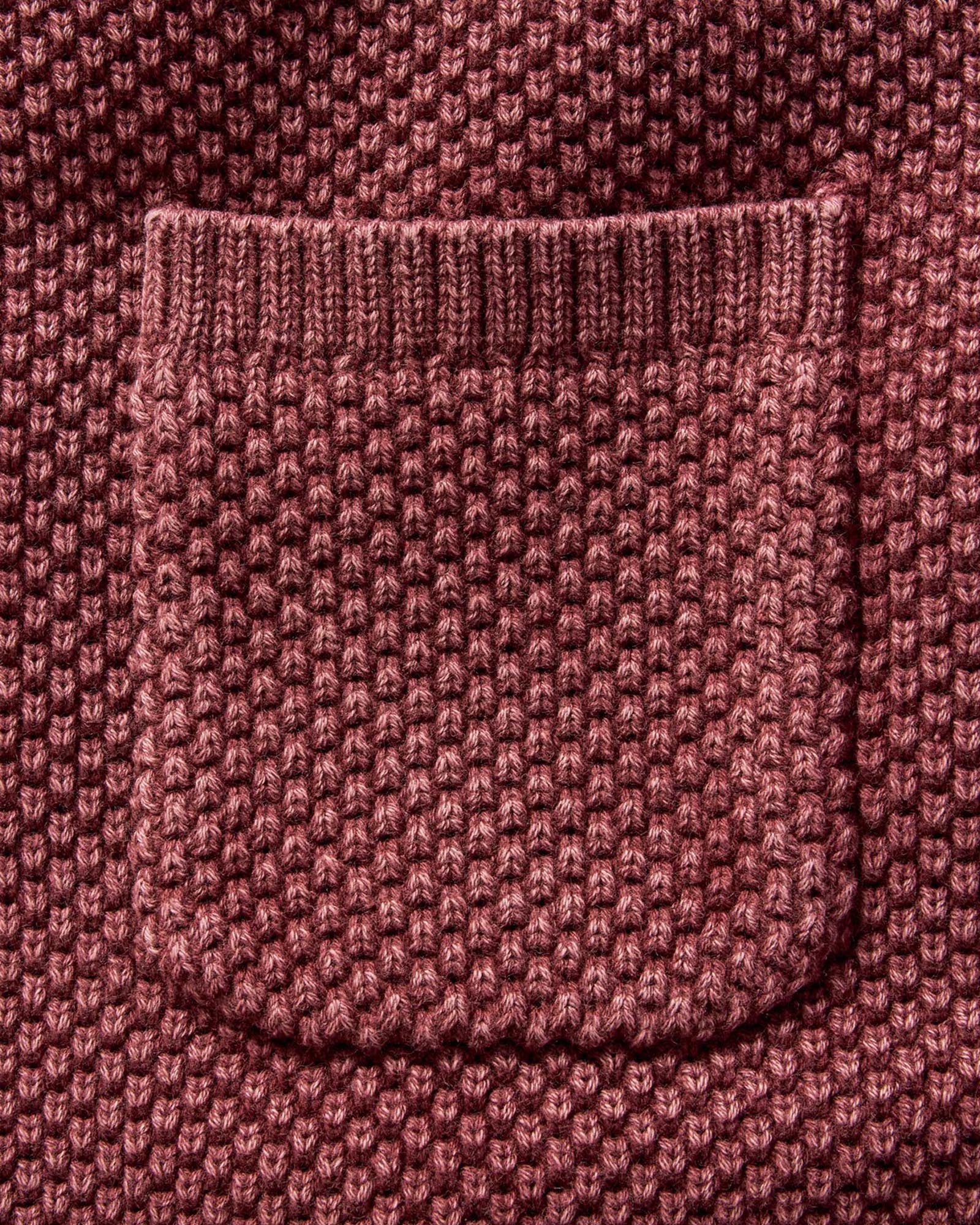 material shot of the pocket on The Crawford Crew Sweater in Dried Cherry, Knits by Taylor Stitch