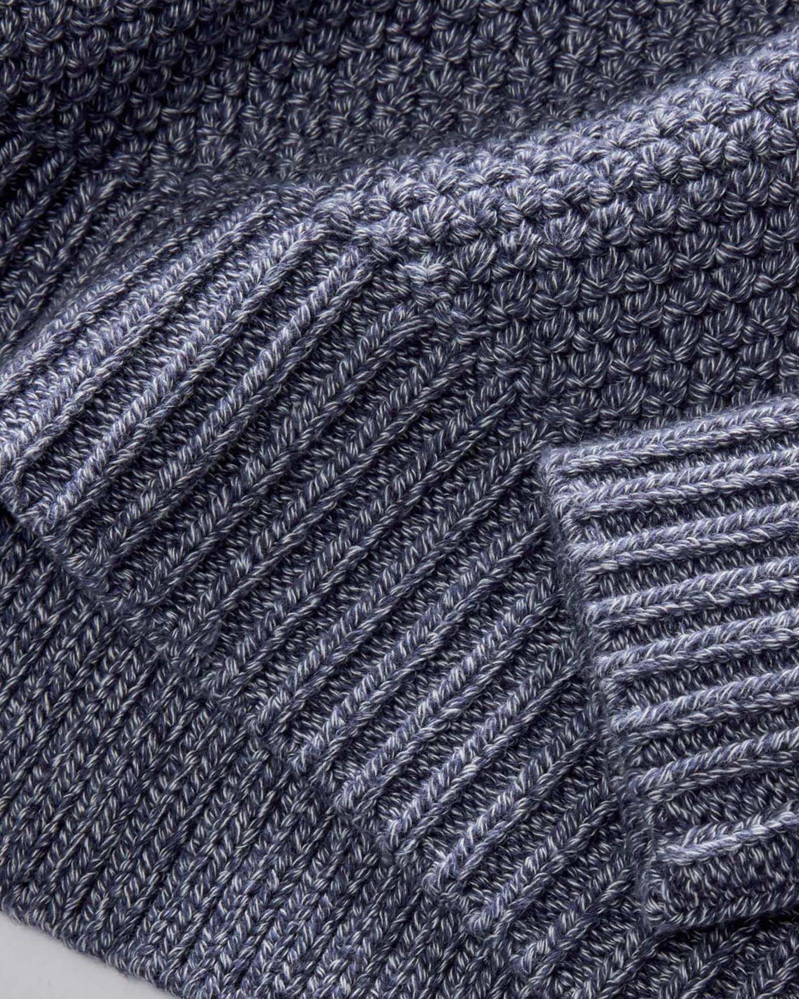 material shot of the sleeves on The Fisherman Sweater in Blue Melange, Knits by Taylor Stitch