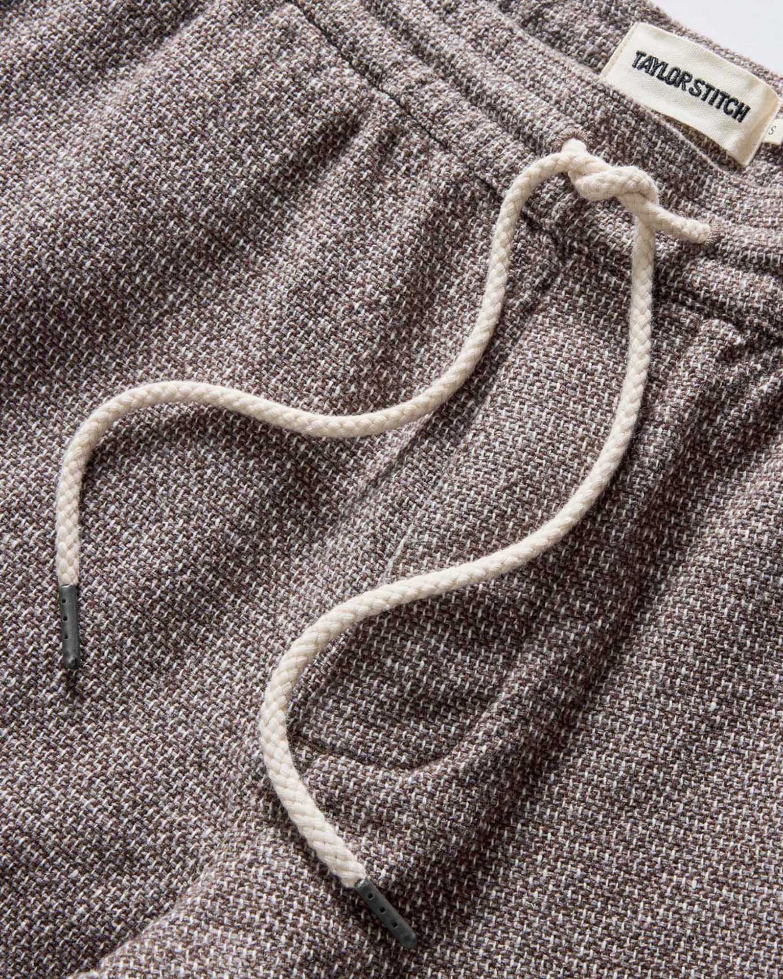 material shot of the waistband on The Apres Pant in Granite Linen Tweed, Bottoms by Taylor Stitch