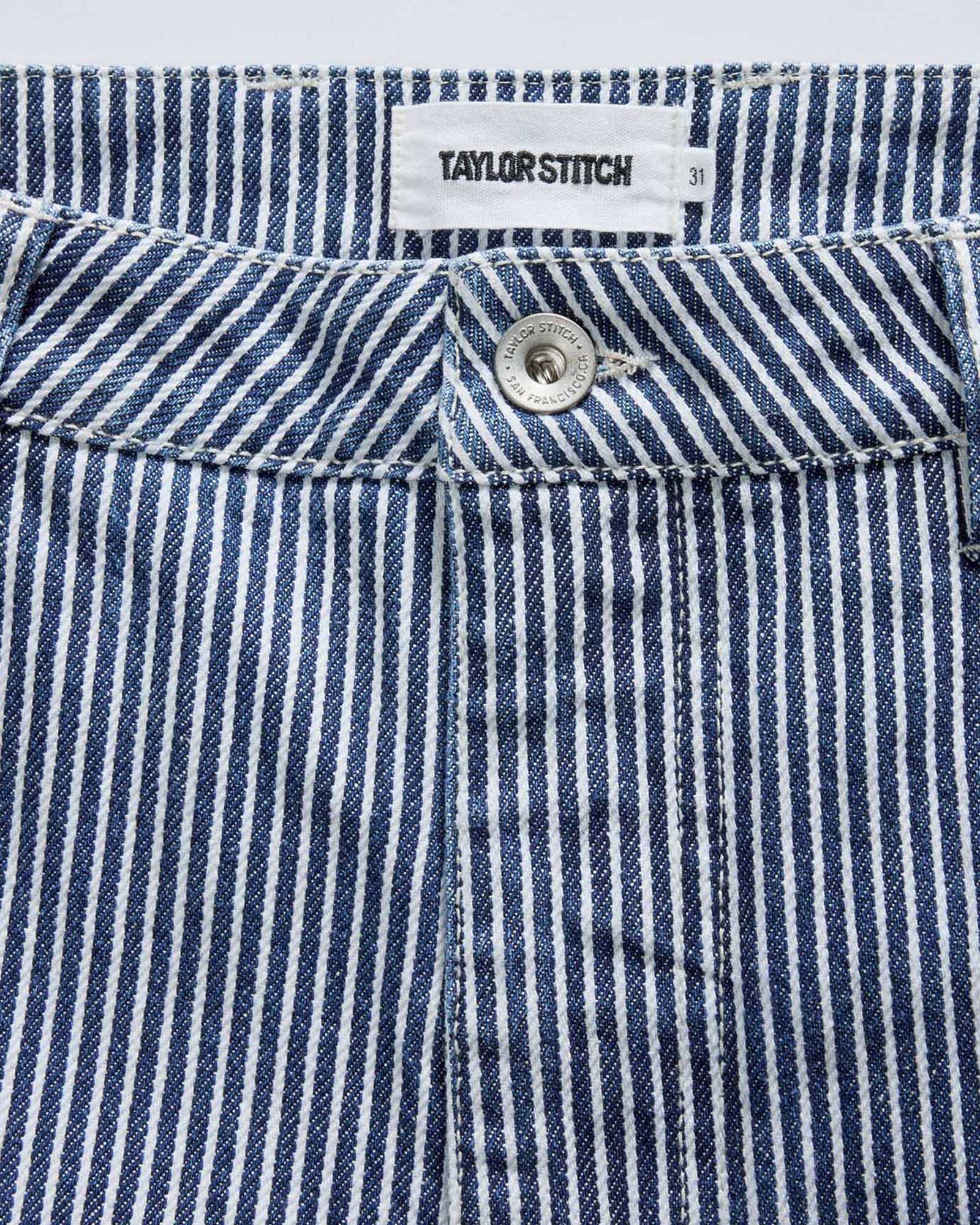 material shot of the button on The Camp Short in Indigo Railroad Stripe Denim, Bottoms by Taylor Stitch
