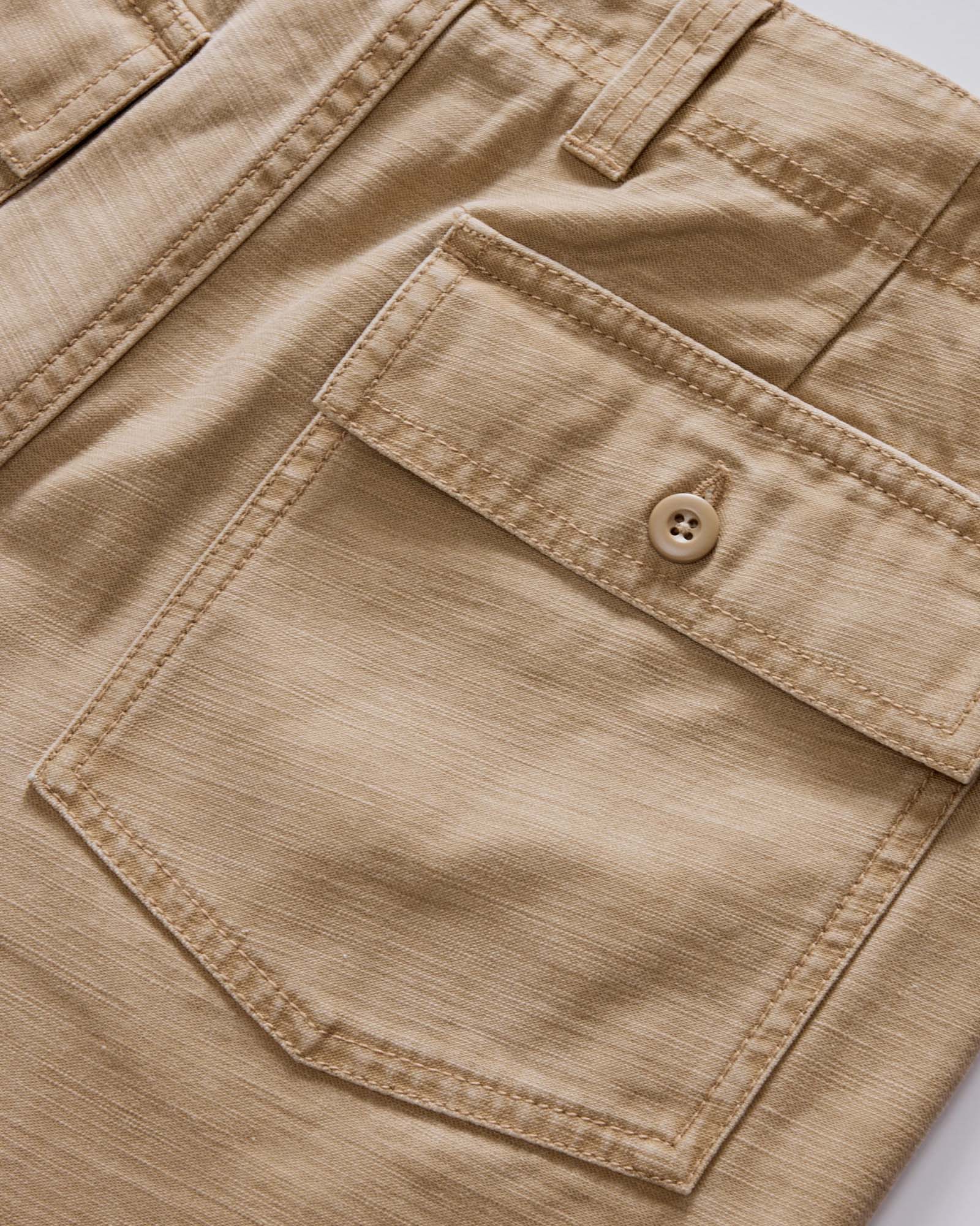 material shot of the back pocket on The Surplus Short in Khaki Reverse Sateen, Bottoms by Taylor Stitch
