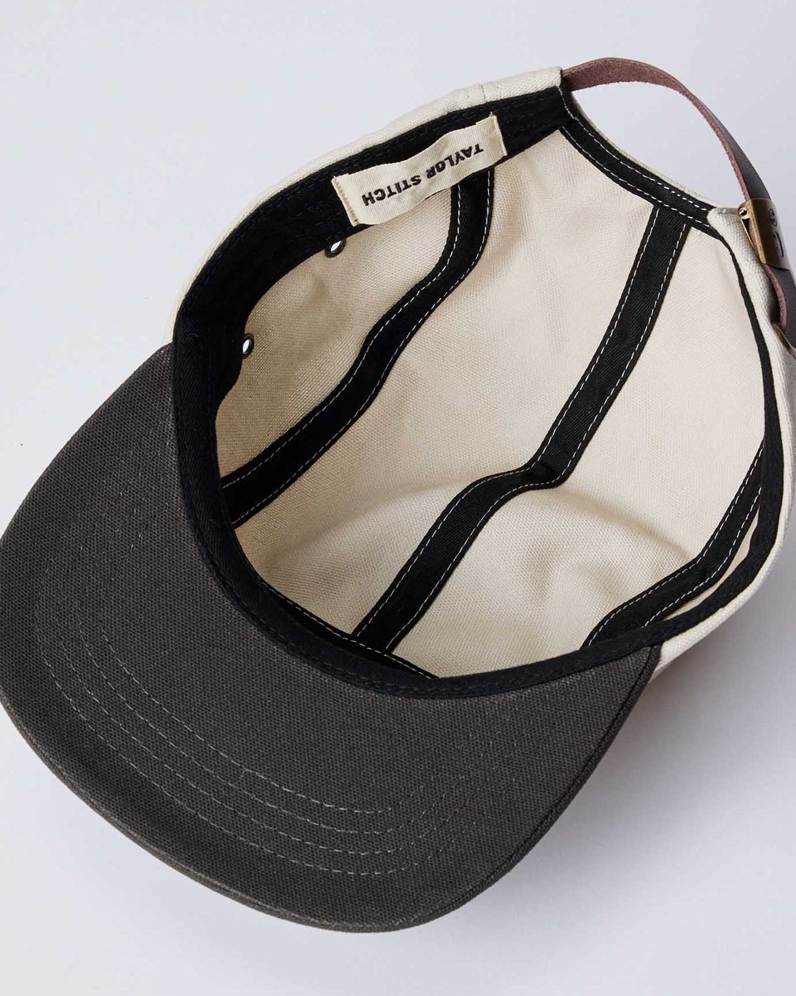 material shot of the inside details on The 5-Panel Cap in Stone Pigment Canvas, Accessories by Taylor Stitch