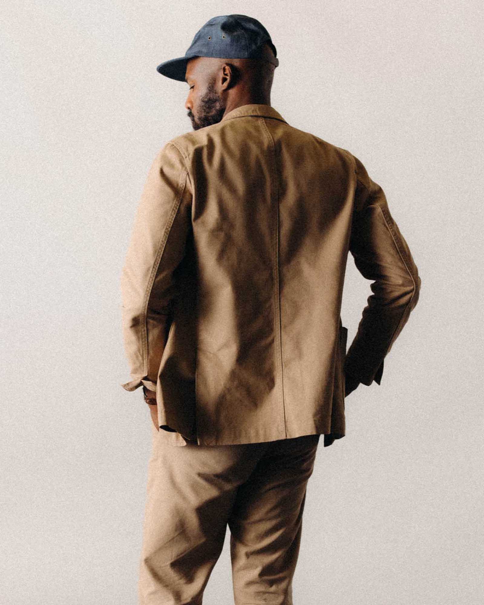 fit model showing off the back of The Foundation Sportcoat in Organic Khaki Twill, Outerwear by Taylor Stitch