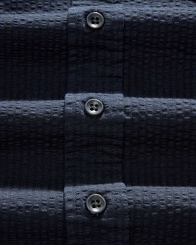 material shot of the buttons on The Jack in Dark Navy Seersucker, Wovens by Taylor Stitch