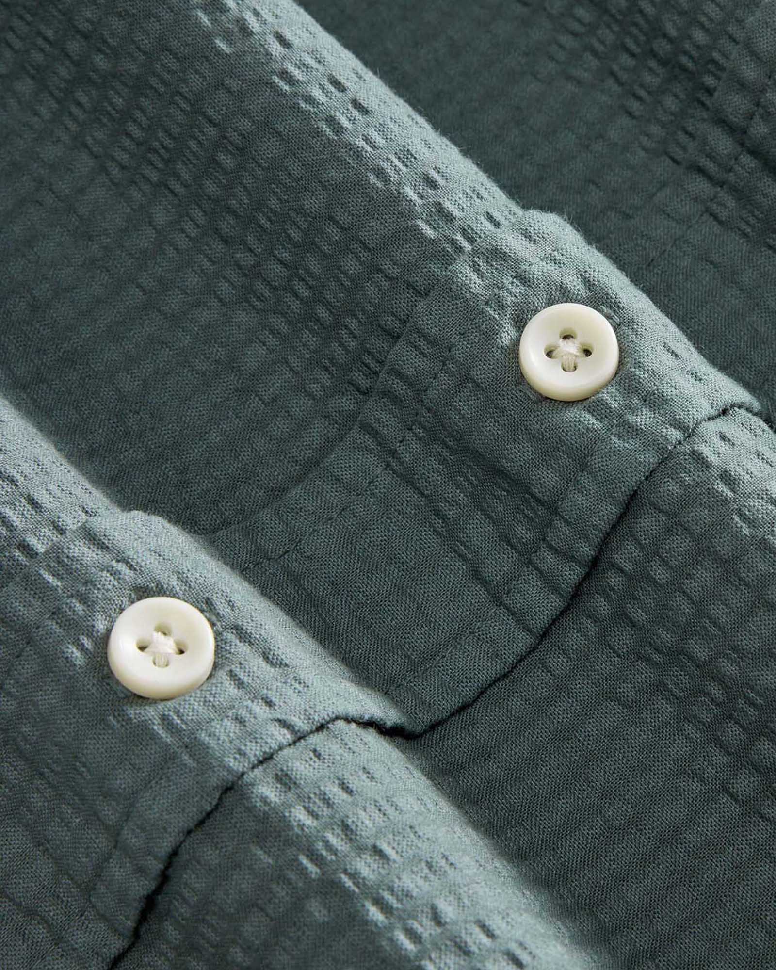 material shot of the buttons on The Jack in Deep Sea Seersucker, Wovens by Taylor Stitch