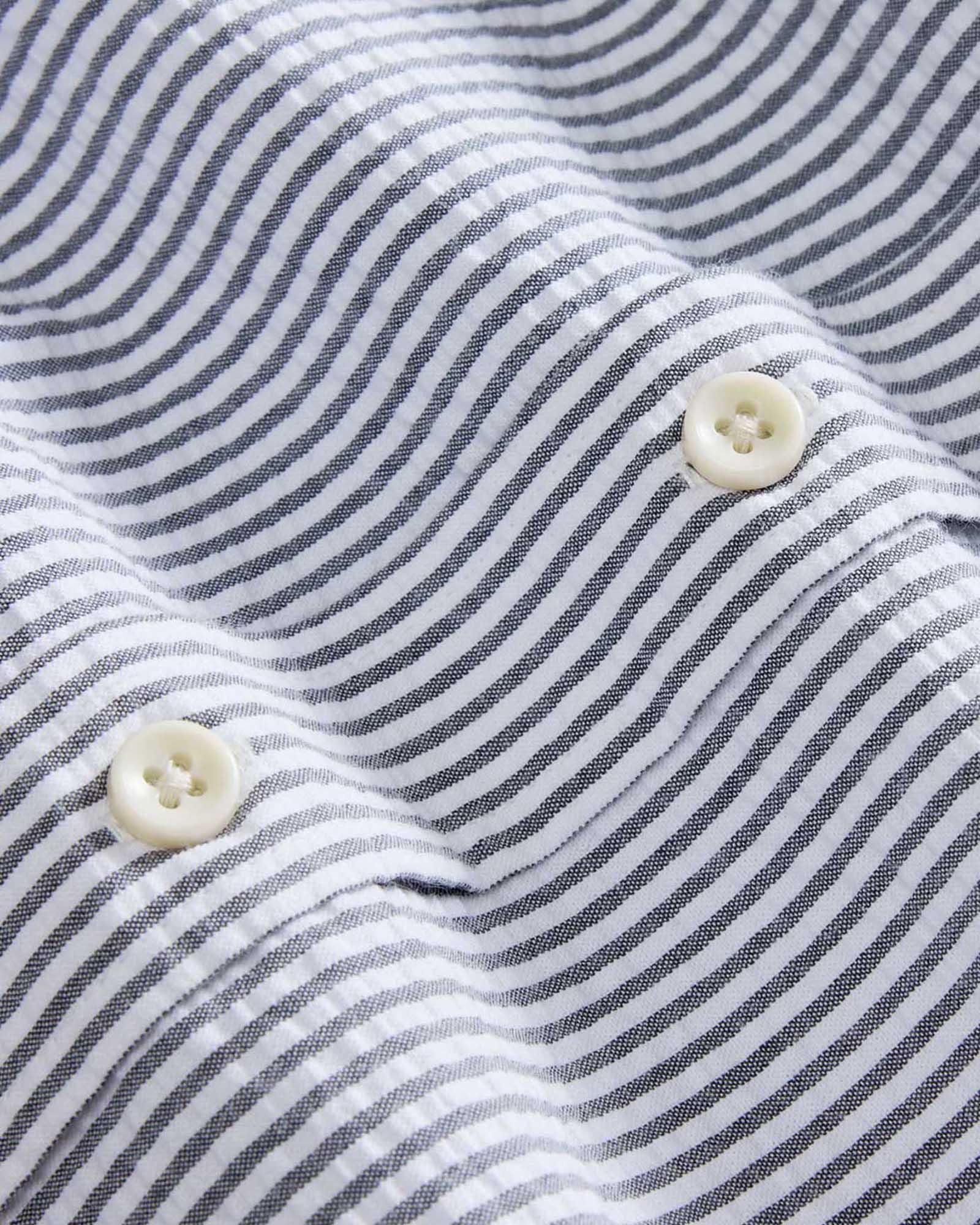 material shot of the buttons on The Jack in Navy Stripe Seersucker, Wovens by Taylor Stitch