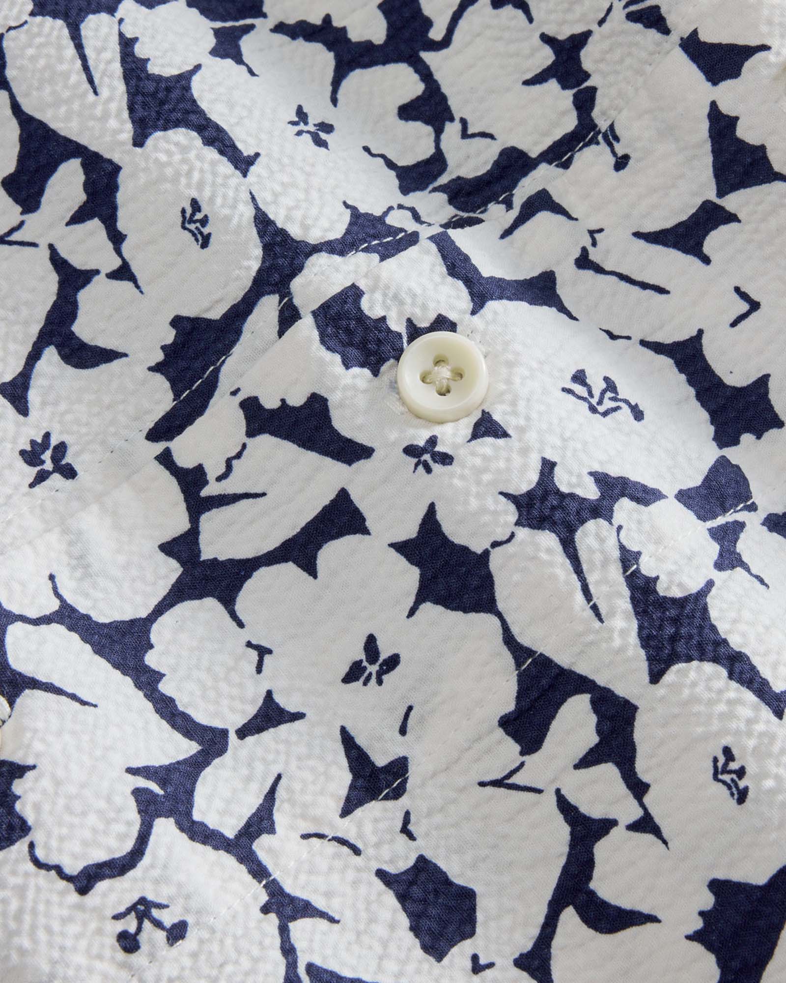 material shot of the buttons on The Hawthorne Shirt in Shadow Floral, Wovens by Taylor Stitch