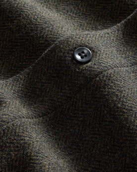 material shot of the buttons on The Coastline Knit Shirt in Heather Army, Knits by Taylor Stitch