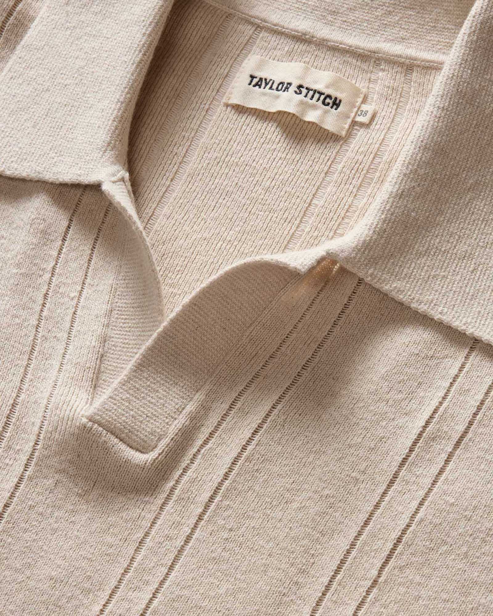 material shot of the collar on The Valencia Sweater Polo in Heather Oat Rib, Knits by Taylor Stitch