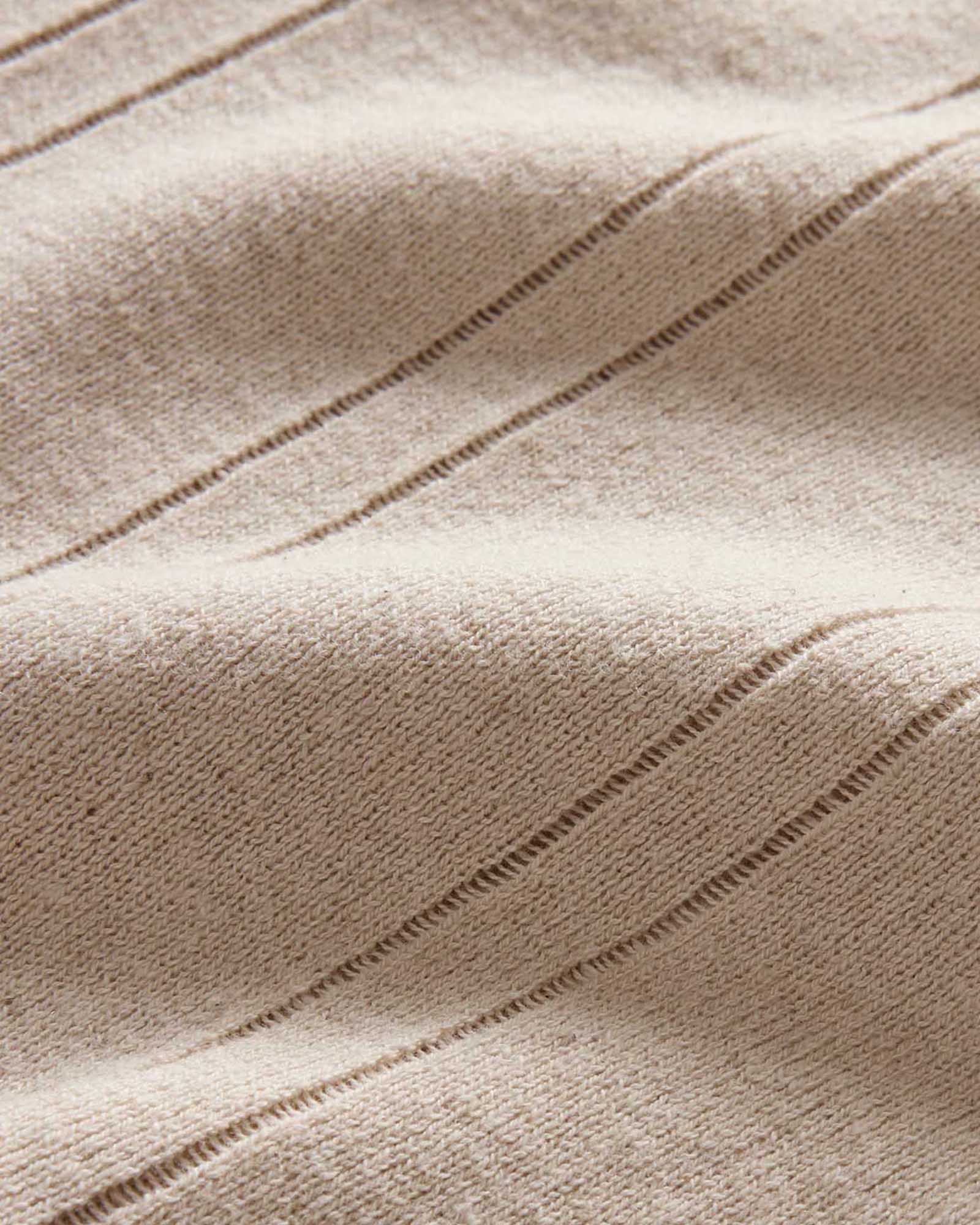 material shot of the details on The Valencia Sweater Polo in Heather Oat Rib, Knits by Taylor Stitch