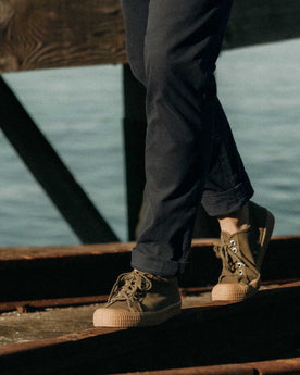 fit model showing off the cuffs on The Democratic Foundation Pant in Organic Navy, Bottoms by Taylor Stitch