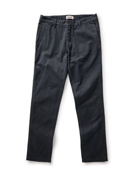 flatlay of The Slim Foundation Pant in Organic Navy, Bottoms by Taylor Stitch