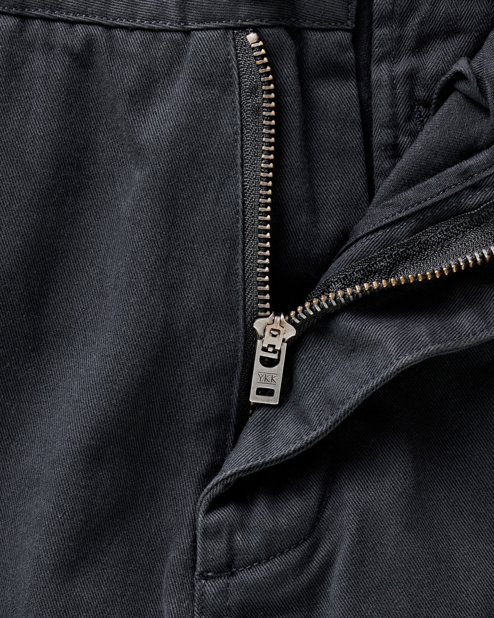 material shot of the zipper on The Slim Foundation Pant in Organic Navy, Bottoms by Taylor Stitch