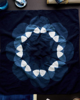 editorial flatlay of The Hand Dyed Bandana in Indigo Petal, Accessories by Taylor Stitch