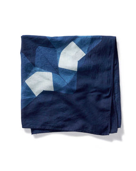 material shot of The Hand Dyed Bandana in Indigo Burst folded, Accessories by Taylor Stitch