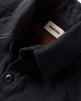 material shot of the collar on The Lined Shop Shirt in Coal Boss Duck, Outerwear by Taylor Stitch
