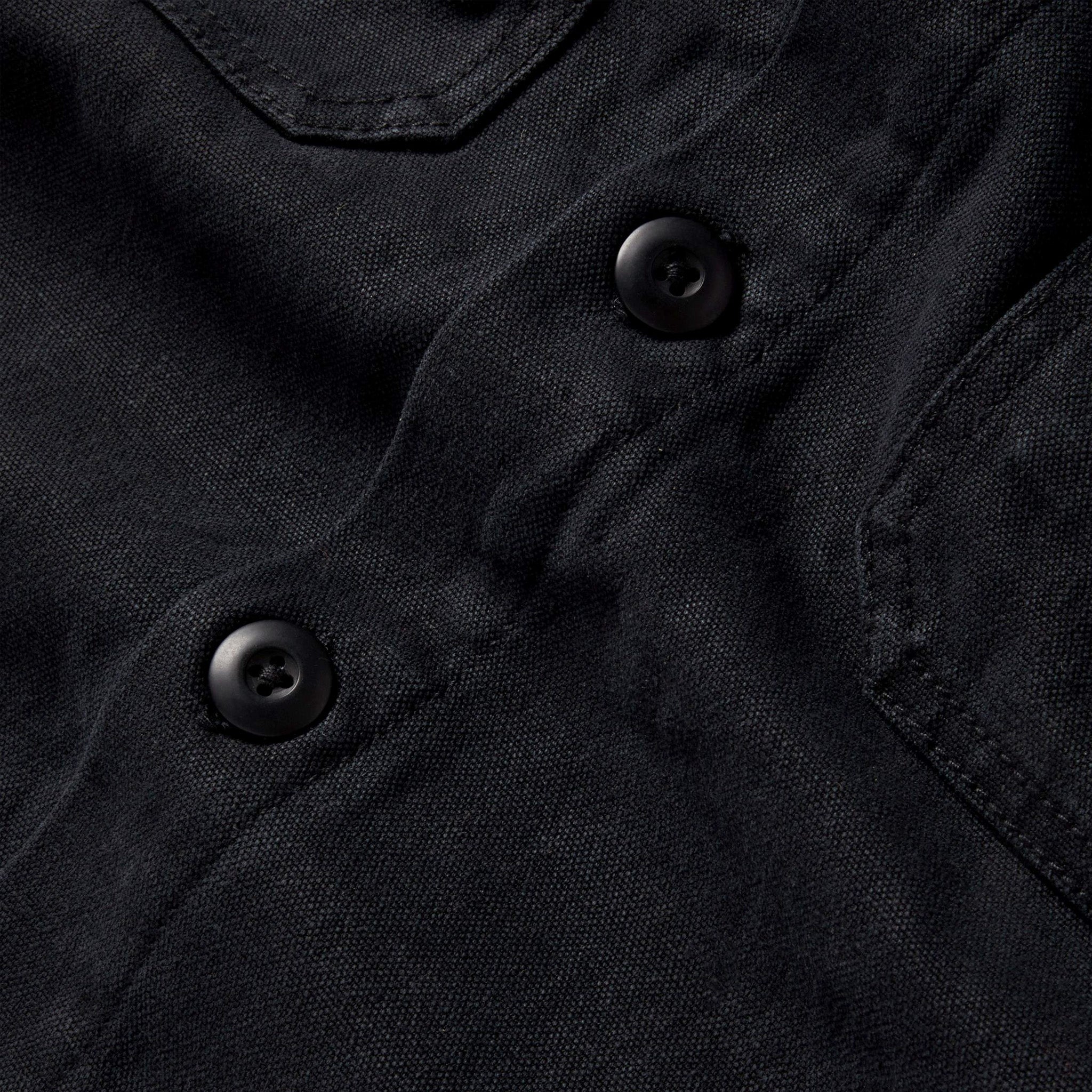 material shot of the buttons on The Lined Shop Shirt in Coal Boss Duck, Outerwear by Taylor Stitch
