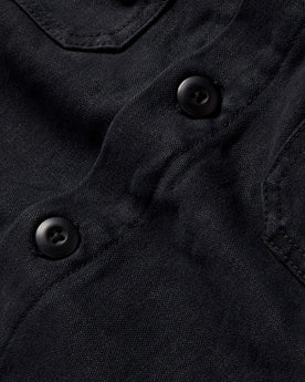 material shot of the buttons on The Lined Shop Shirt in Coal Boss Duck, Outerwear by Taylor Stitch
