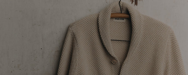 fit model posing in The Crawford Sweater in Charcoal