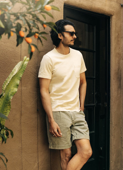 Model wearing The Heavy Bag Tee in Horchata and The Matlow Short in Arid Eucalyptus