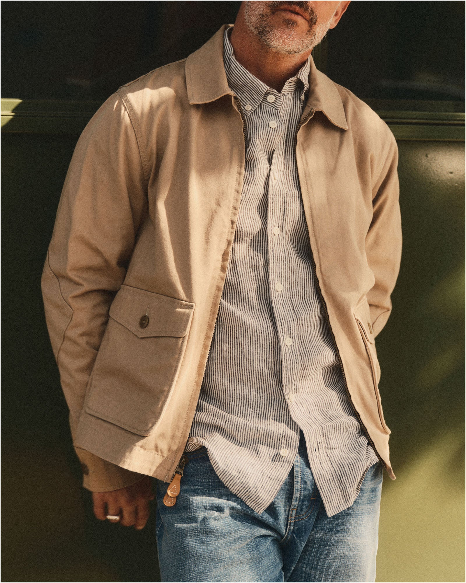 fit model showing off The Airman Jacket in Organic Khaki Foundation Twill, Outerwear by Taylor Stitch
