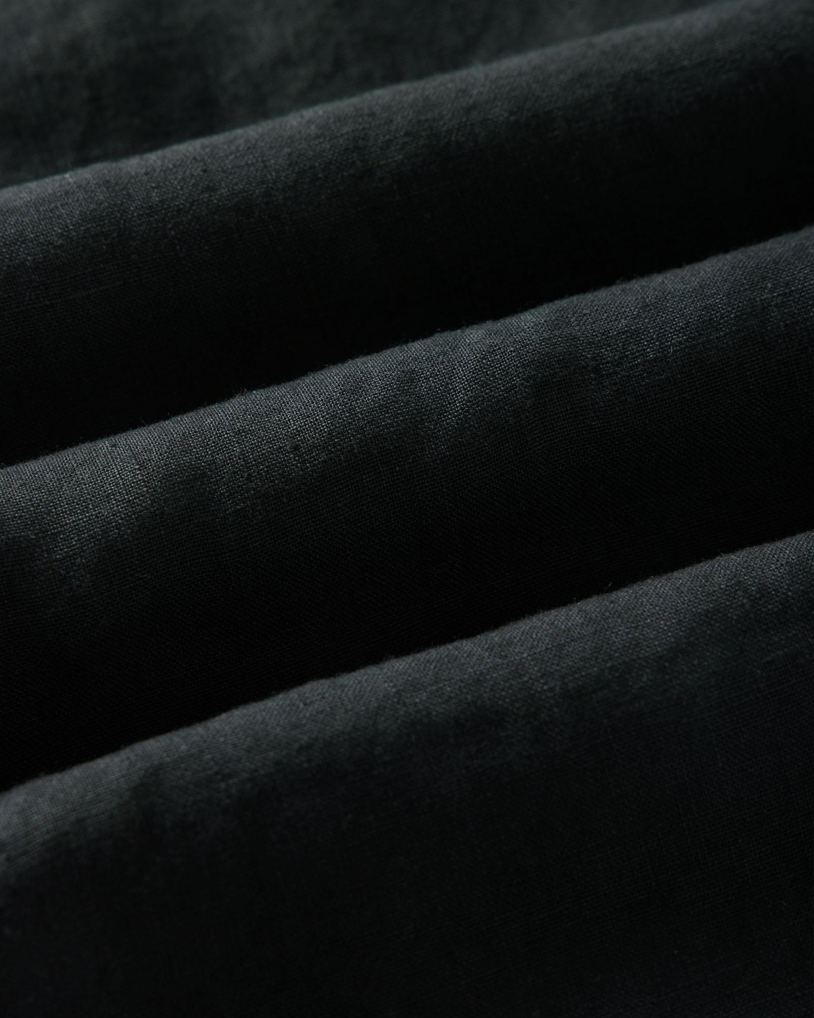 material shot of the fabric on The Apres Short in Coal Hemp, Bottoms by Taylor Stitch
