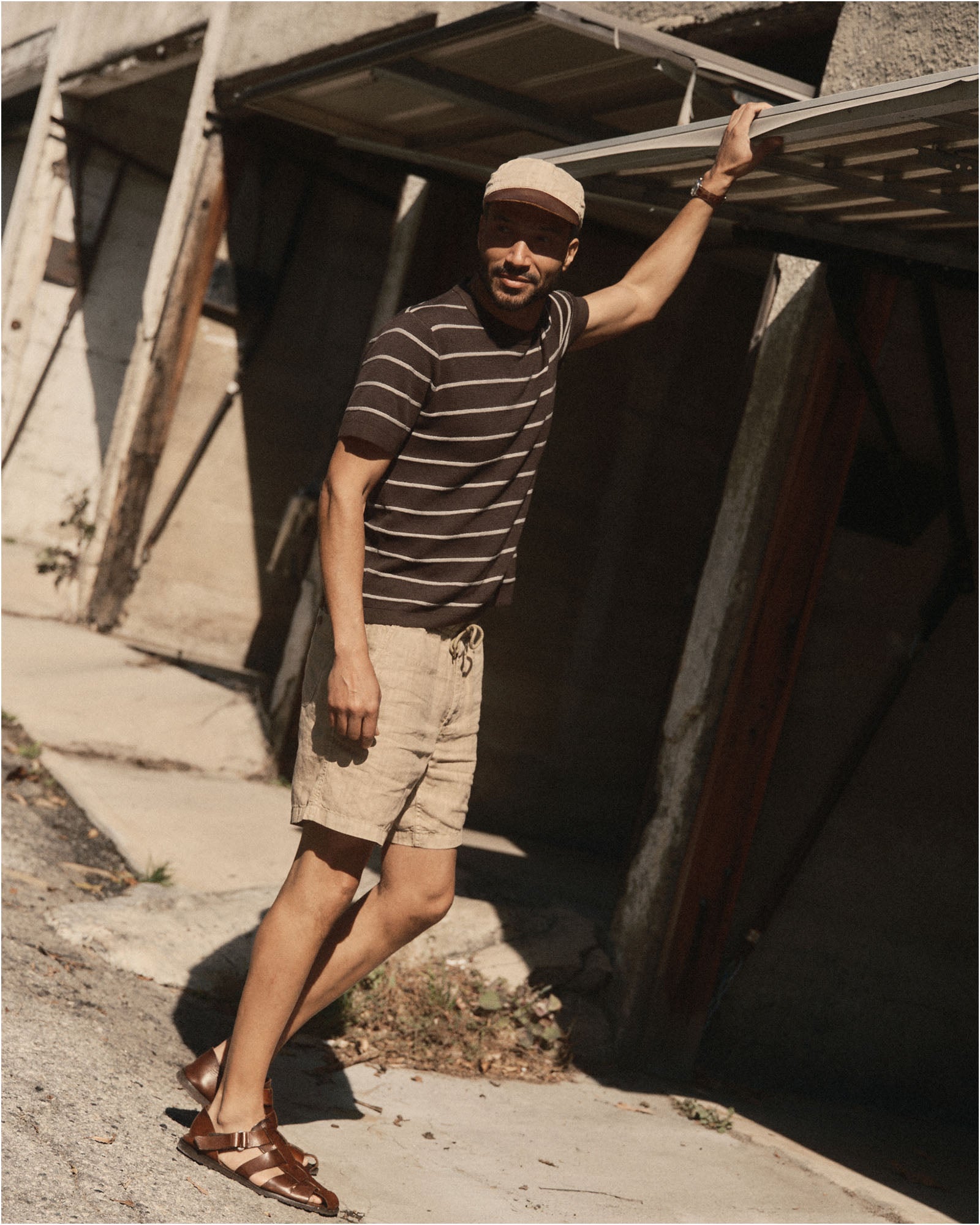fit model showing off The Brody Sweater Tee in Espresso Stripe, Knits by Taylor Stitch