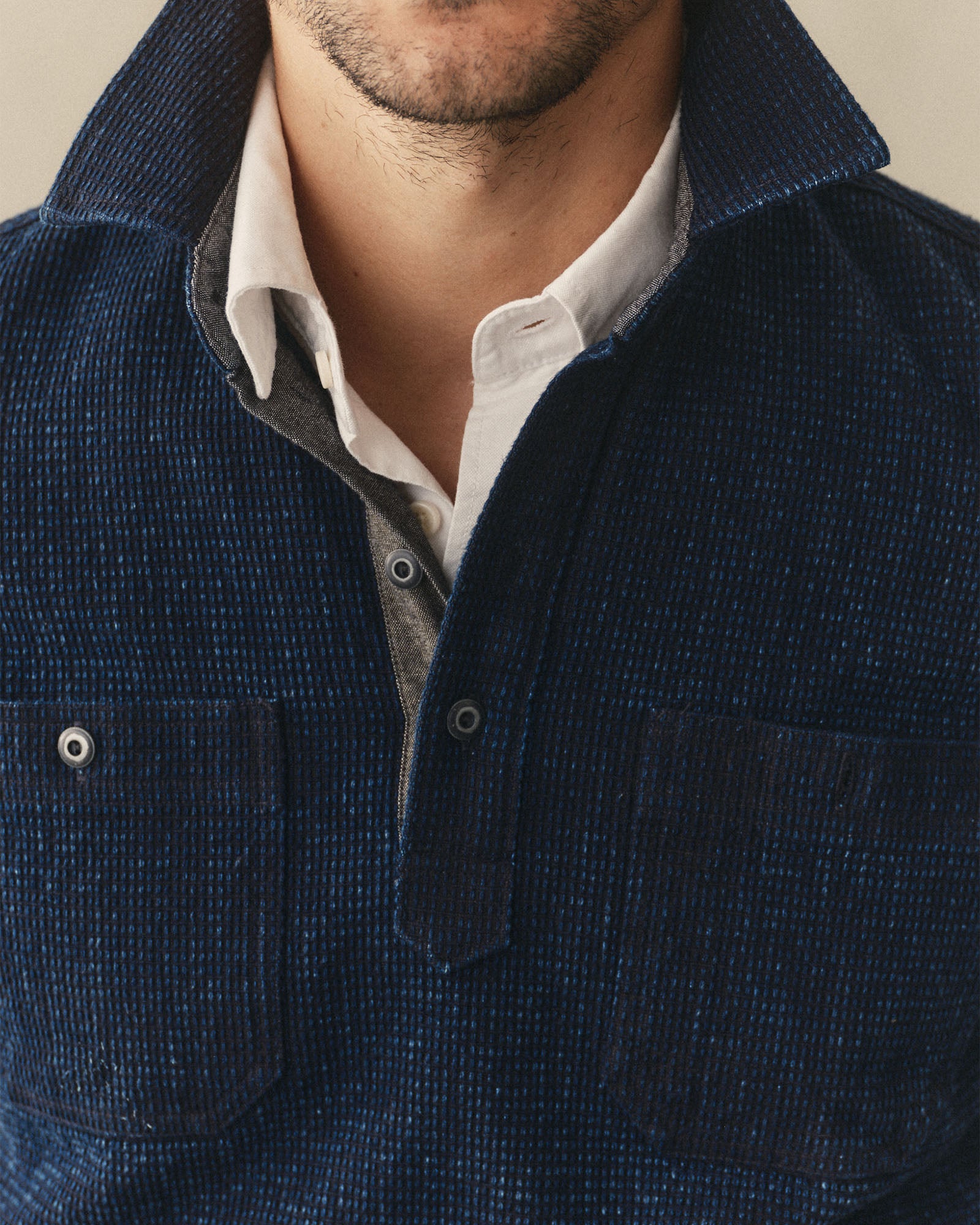 fit model showing off the collar on The Canal Popover in Rinsed Indigo, Knits by Taylor Stitch
