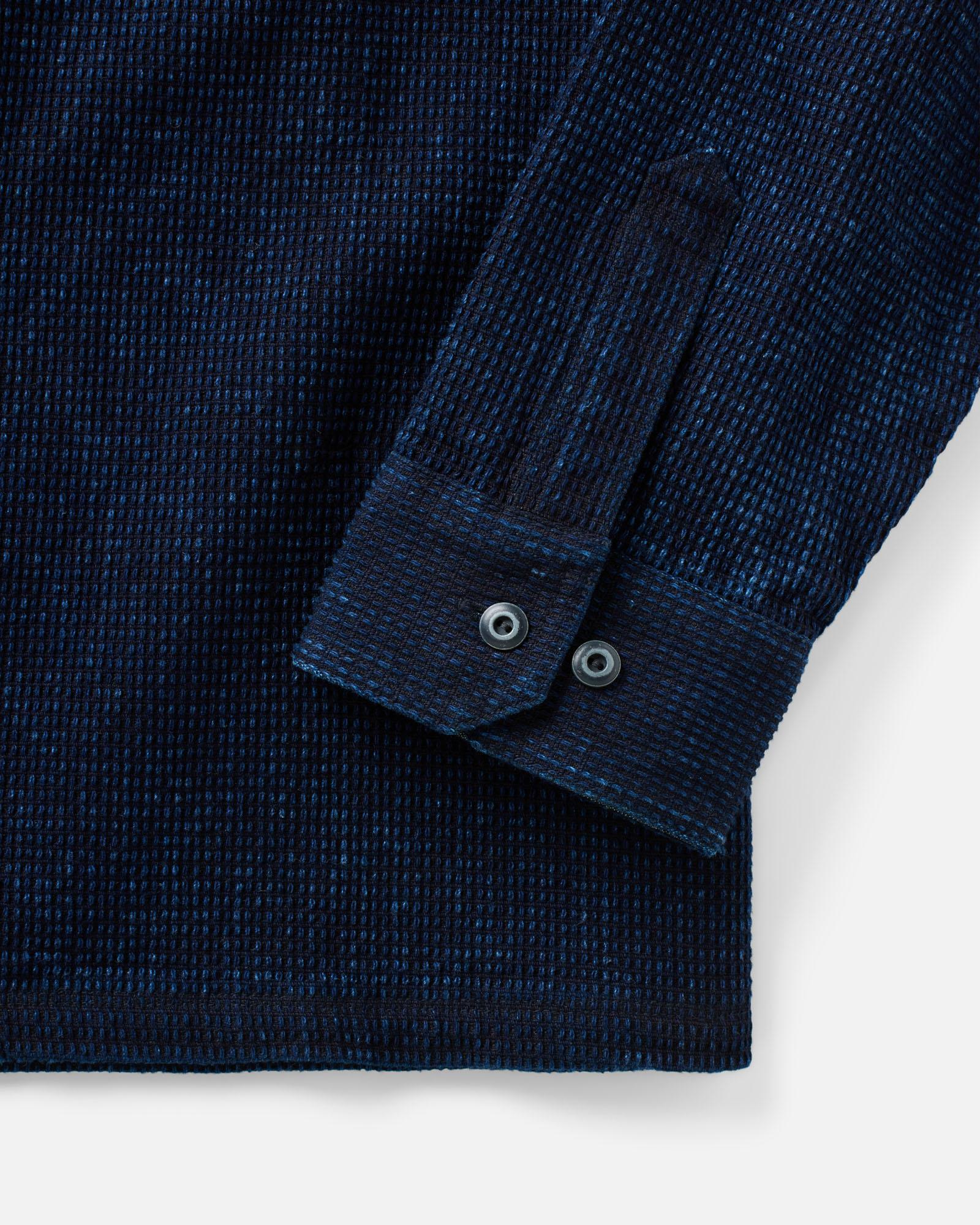 material shot of the sleeve on The Canal Popover in Rinsed Indigo, Knits by Taylor Stitch