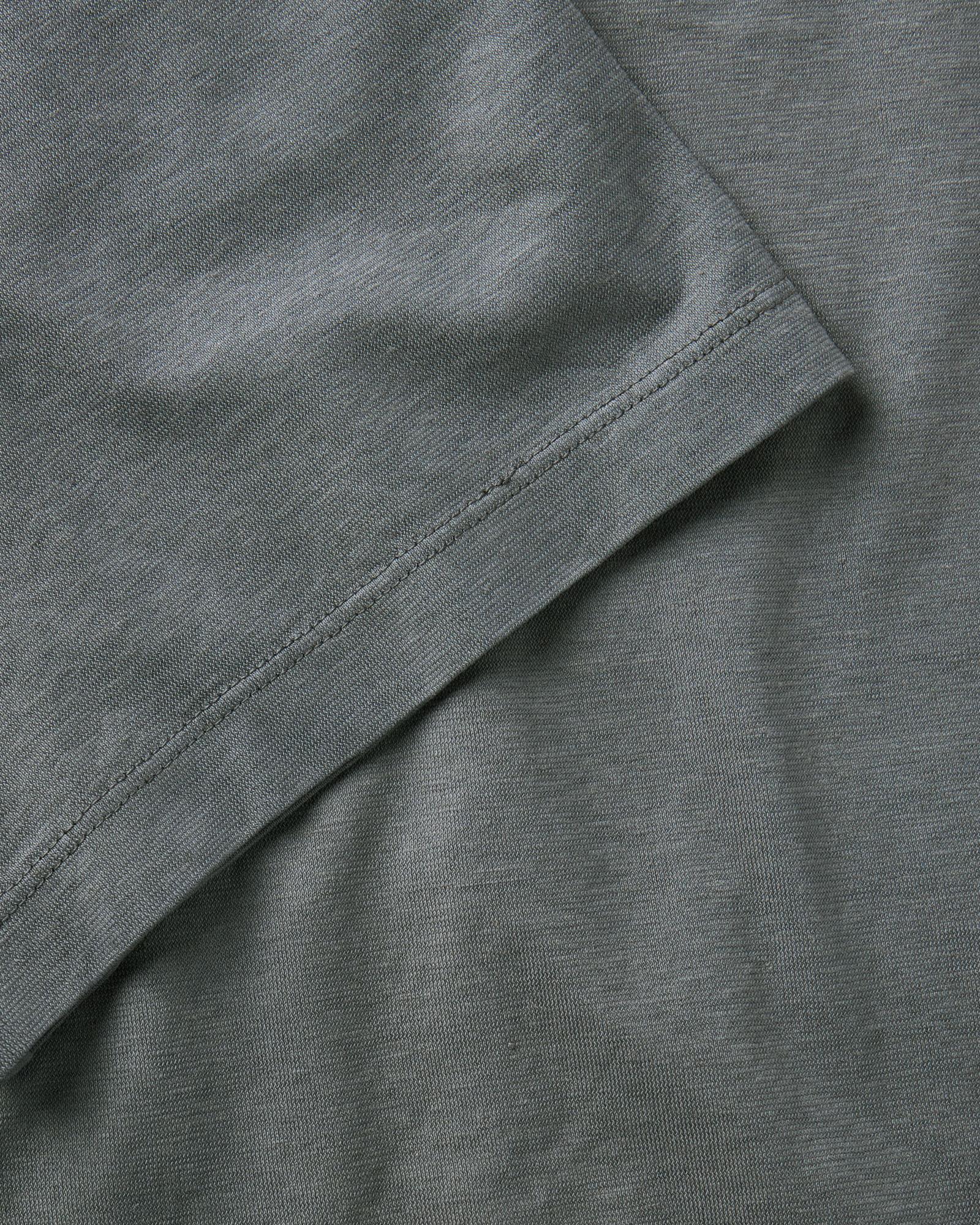 material shot of the sleeve on The Cotton Hemp Polo in Faded Black, Knits by Taylor Stitch