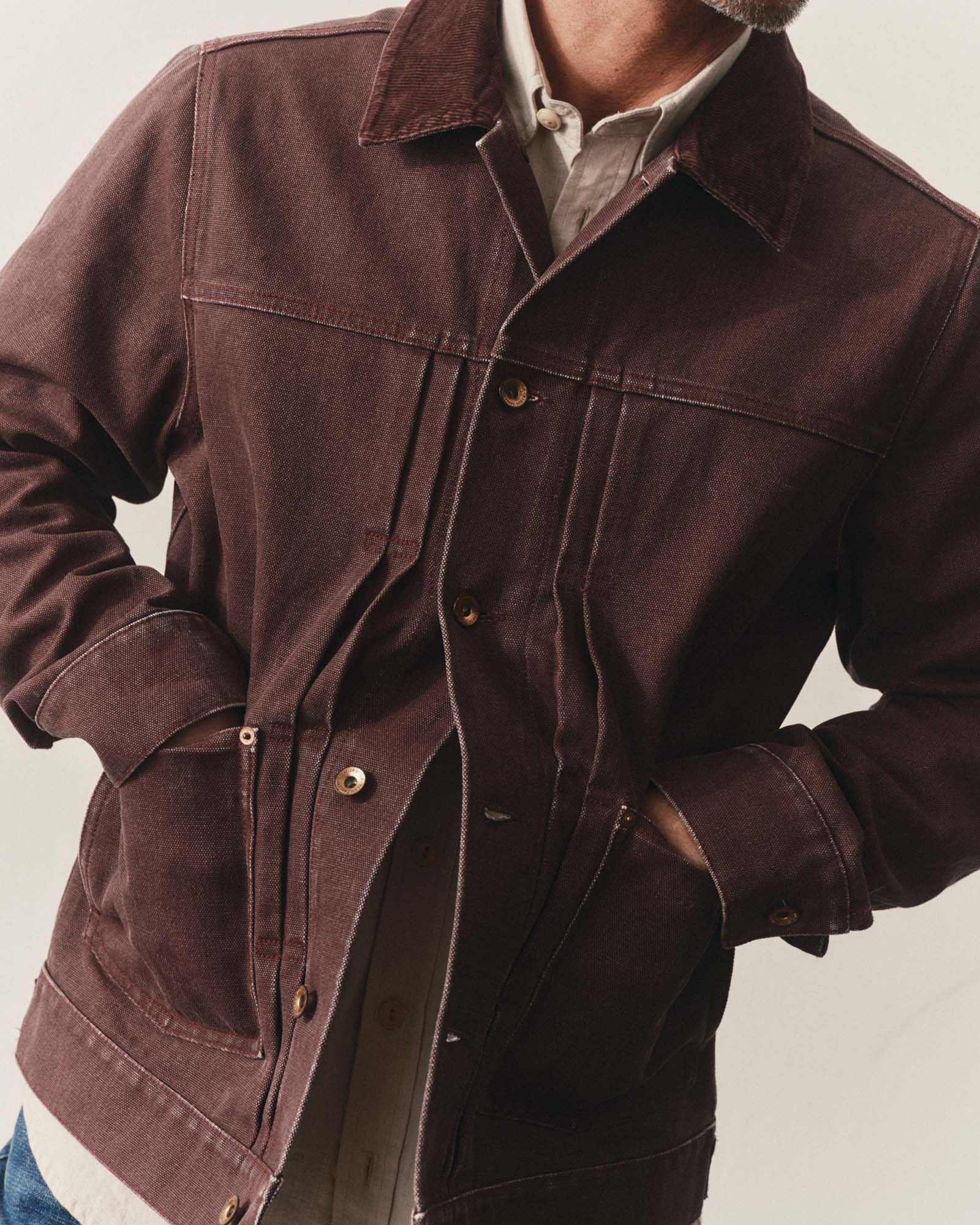 fit model with his hands in his pockets wearing The Ryder Jacket in Burgundy Chipped Canvas, Outerwear by Taylor Stitch